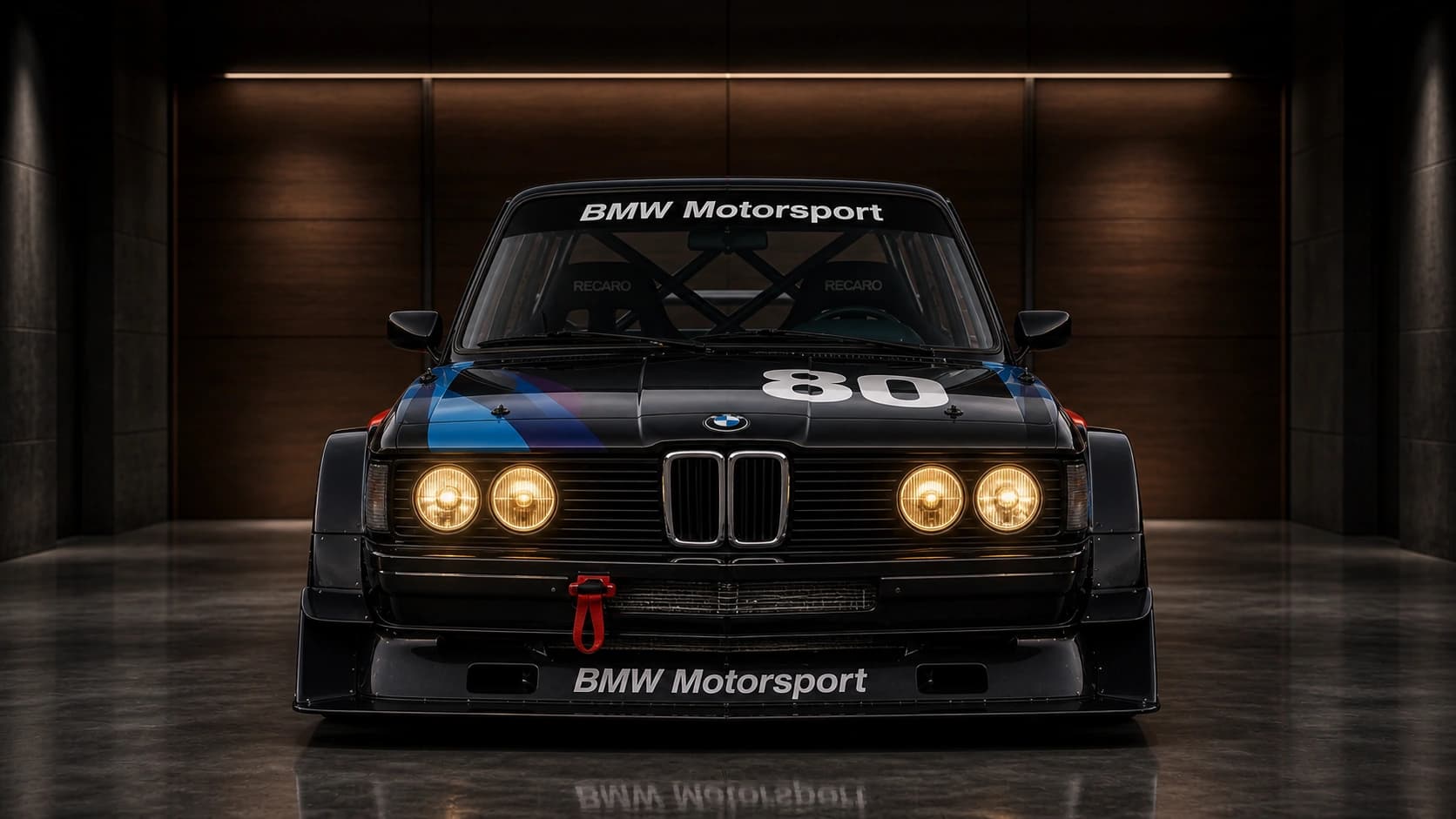 BMW E30 Motorsport 80 чёрного цвета в тёмном роскошном гараже — для продуктивного рабочего пространства