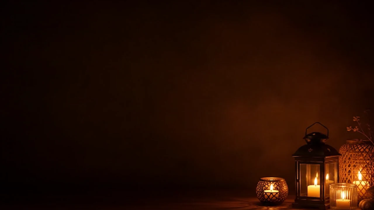 Las llamas de las velas titilan suavemente en una habitación tranquila.